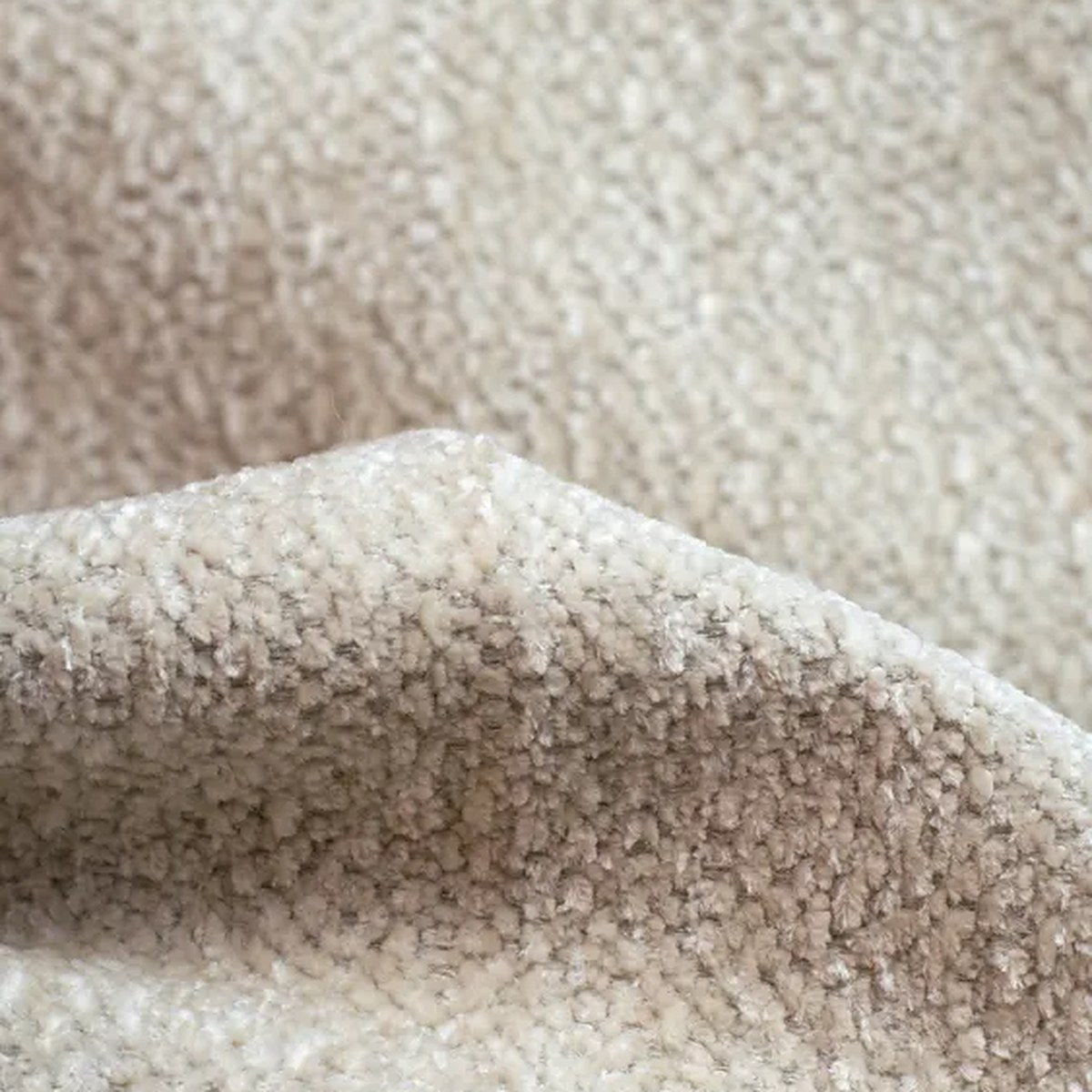 Eetkamerstoel Dublin Beige - close-up van de beige boucle stof